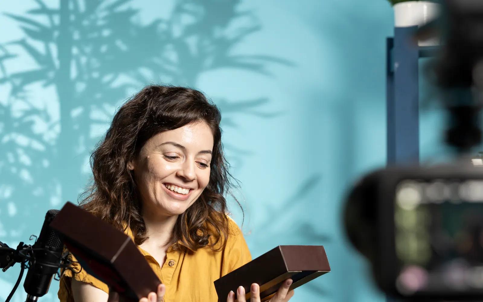 Social media influencer presenting a product on camera
